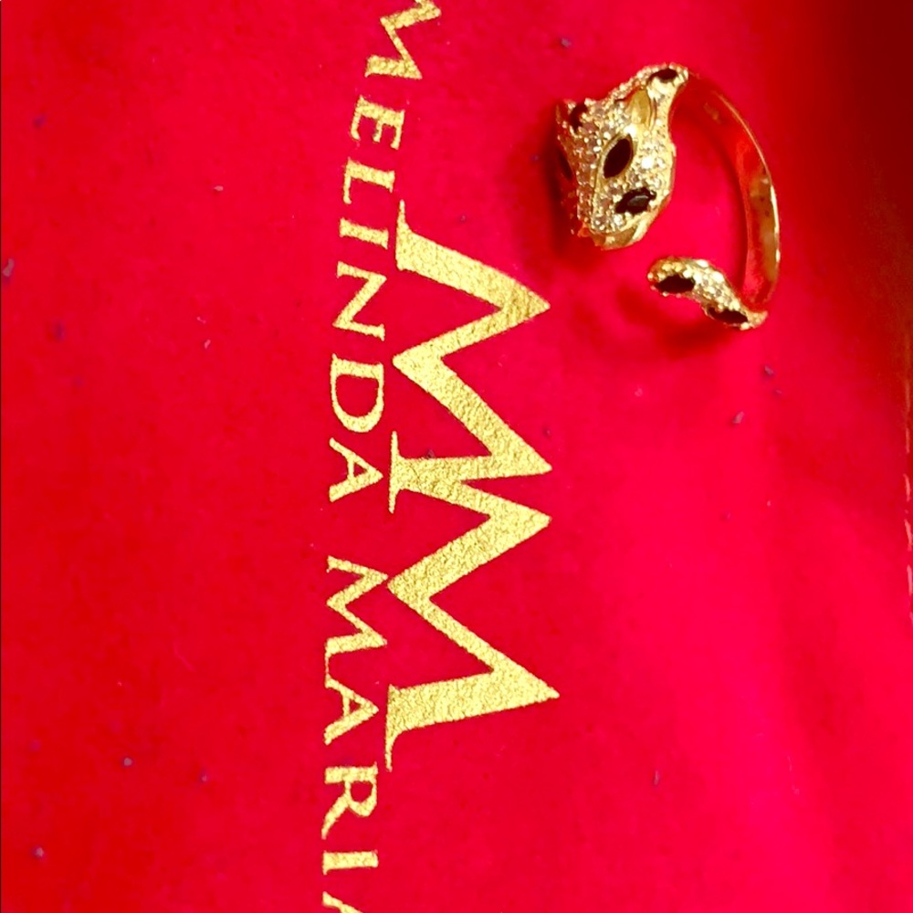Gold and black jaguar ring